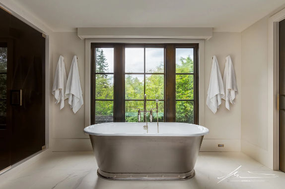 HDR photo of bathroom with a view out of the window